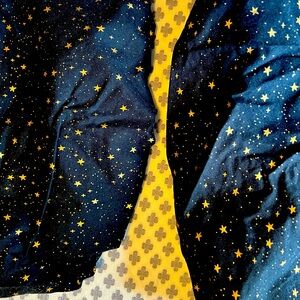 Matching crib sheet and changing pad cover